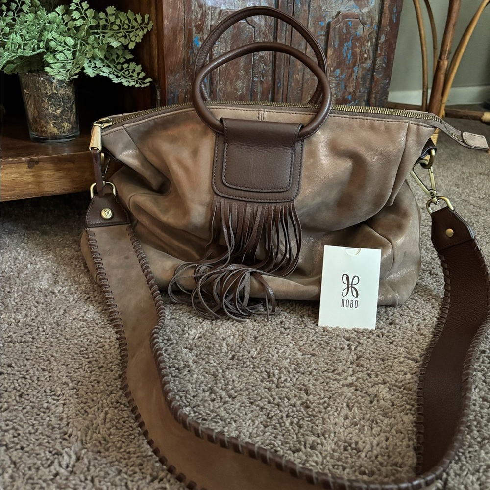 HOBO Large  limited edition fringe metallic leather Sheila bag.